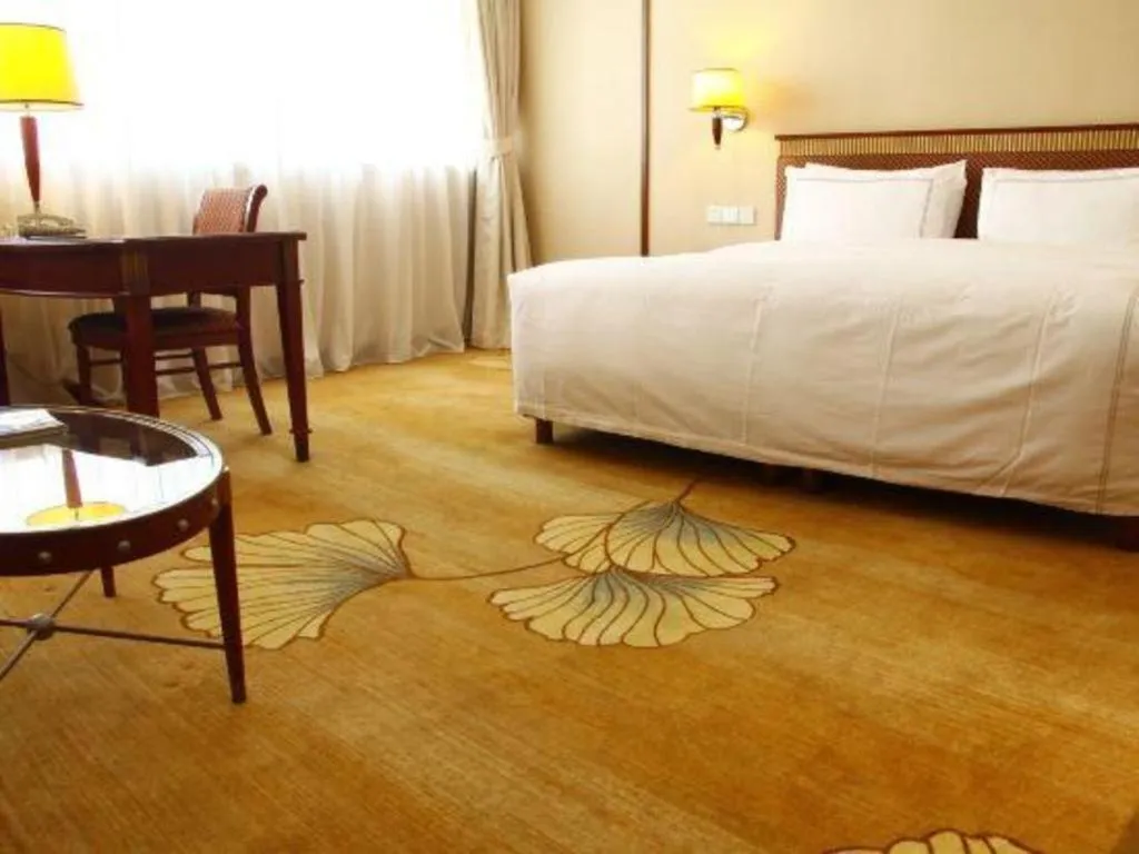 Bed in Jianguo Garden Hotel