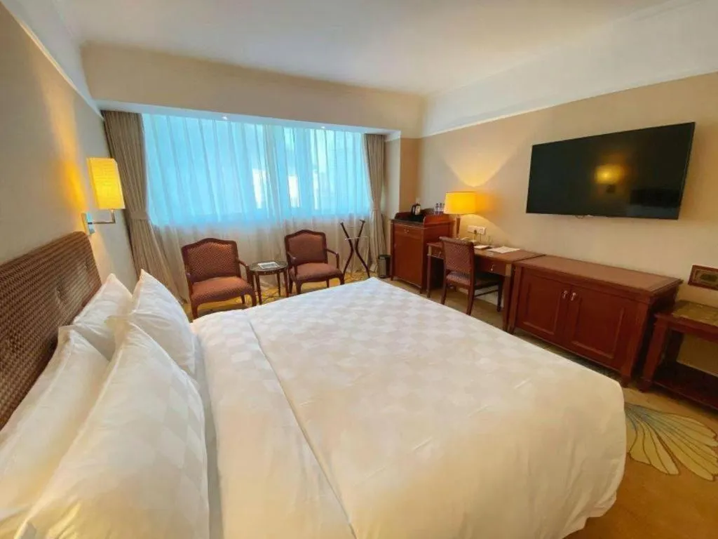 Bed in Jianguo Garden Hotel