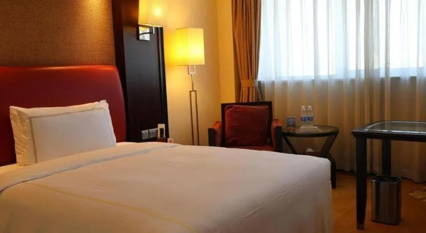 Bed in Jianguo Garden Hotel