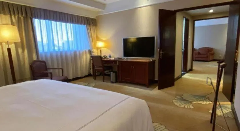 Bed in Jianguo Garden Hotel