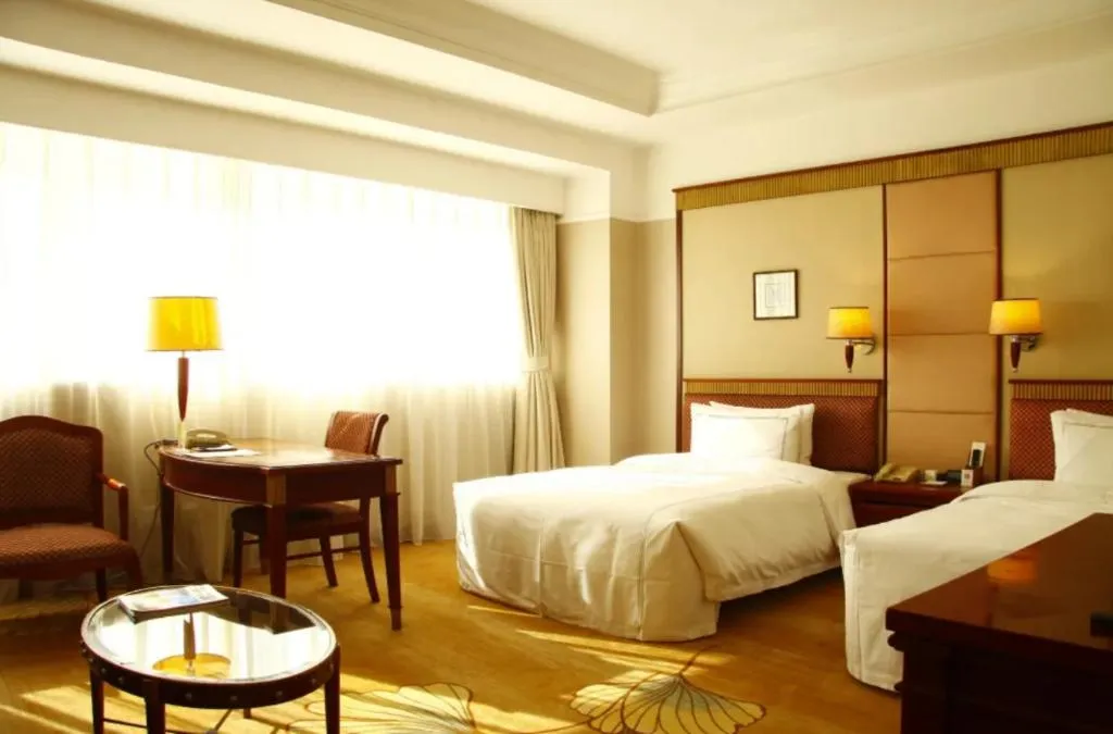 Bed in Jianguo Garden Hotel