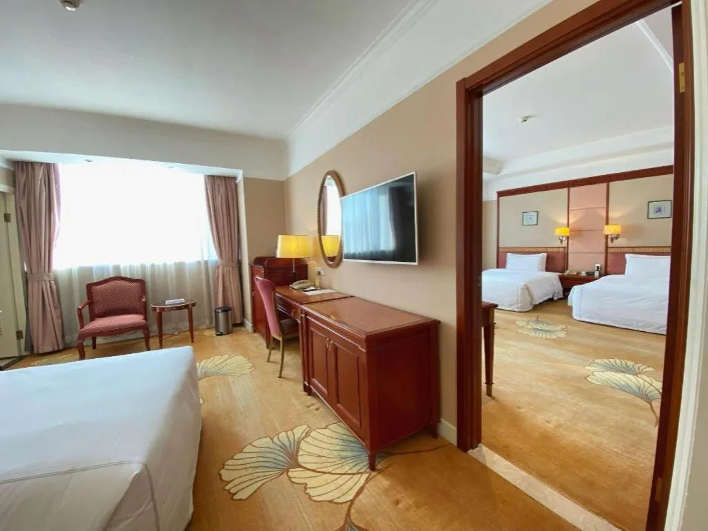 Bed in Jianguo Garden Hotel