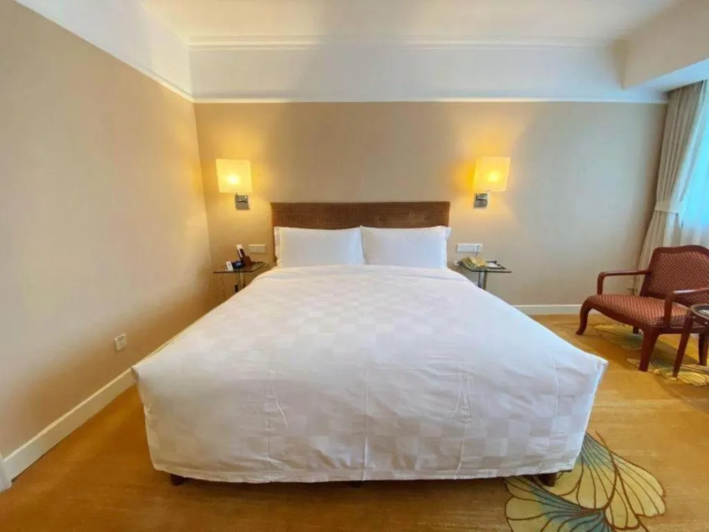 Bed in Jianguo Garden Hotel