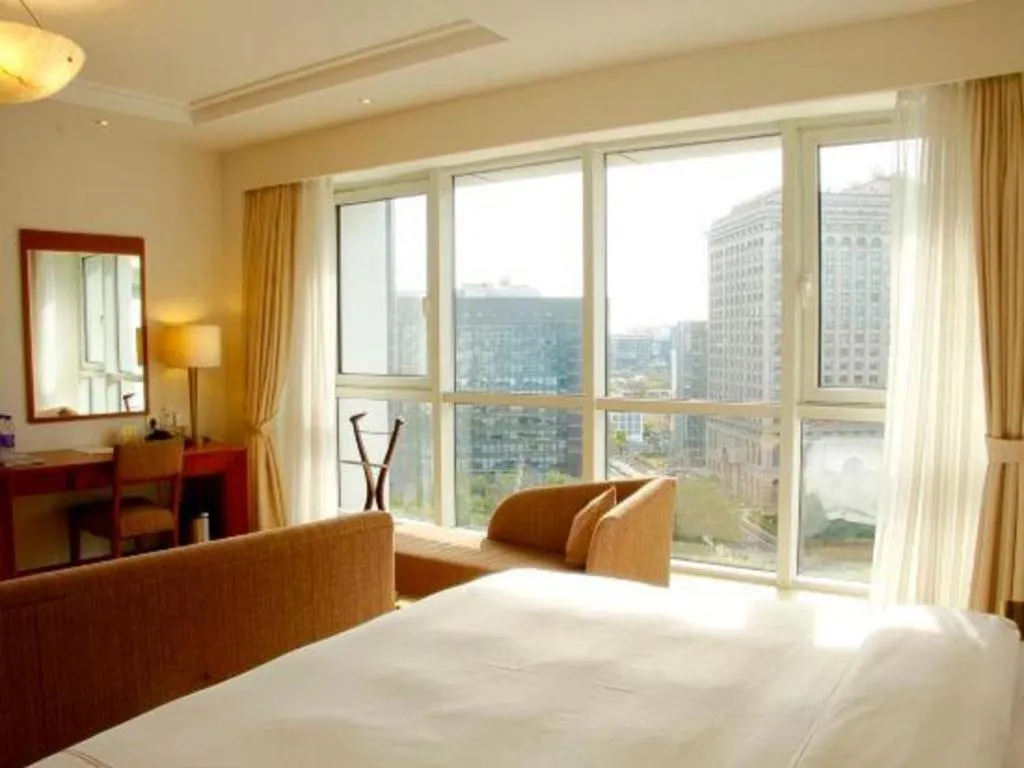 Bed in Jianguo Garden Hotel