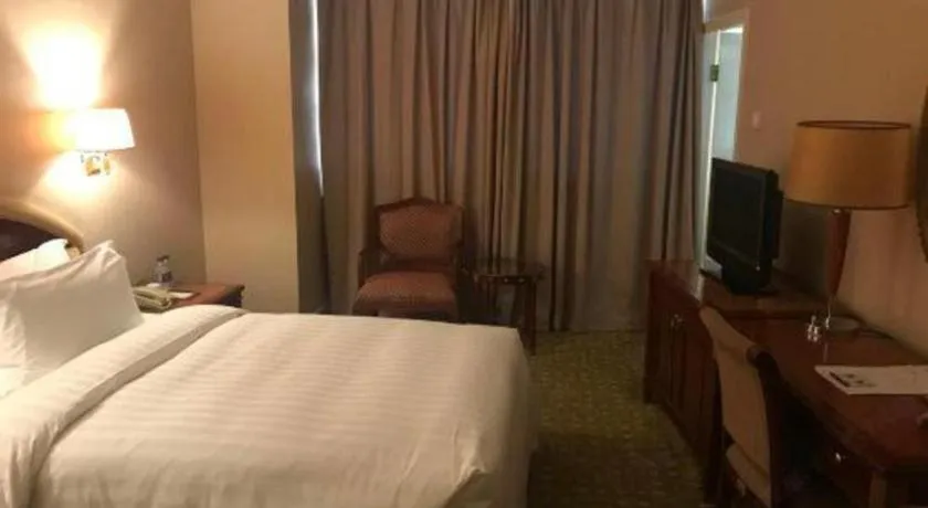 Bed in Jianguo Garden Hotel