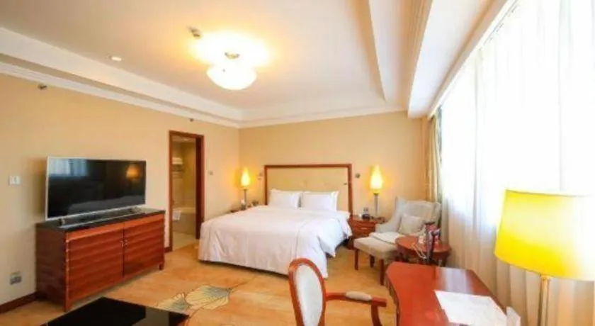 Bed in Jianguo Garden Hotel