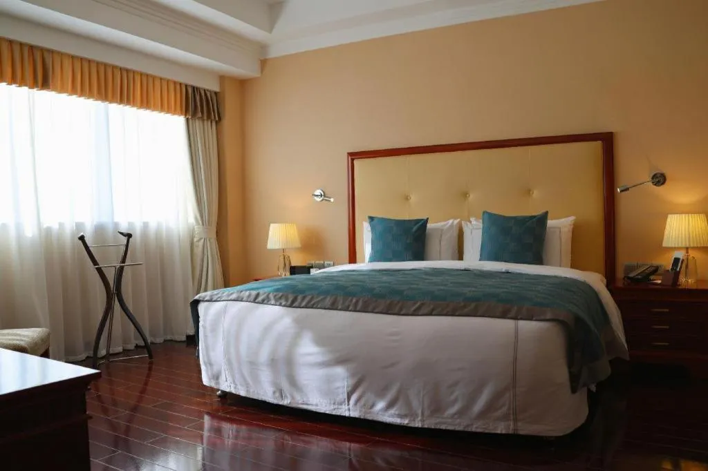 Bed in Jianguo Garden Hotel