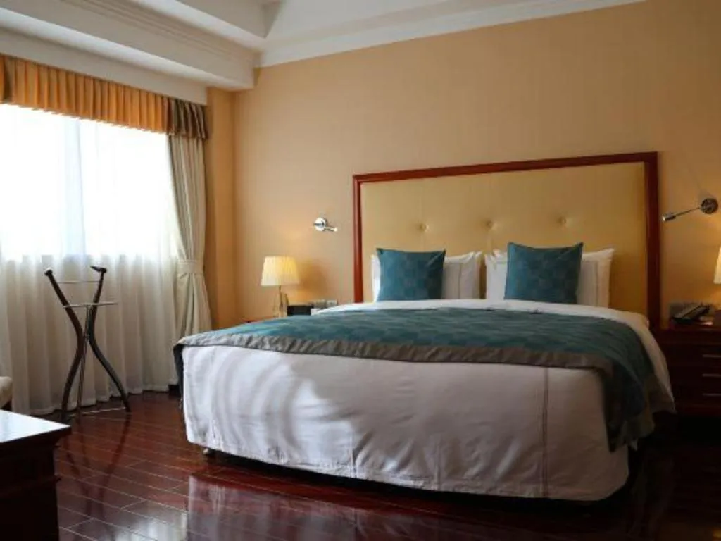 Bed in Jianguo Garden Hotel