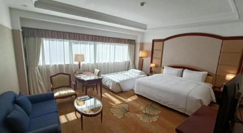 Bed in Jianguo Garden Hotel