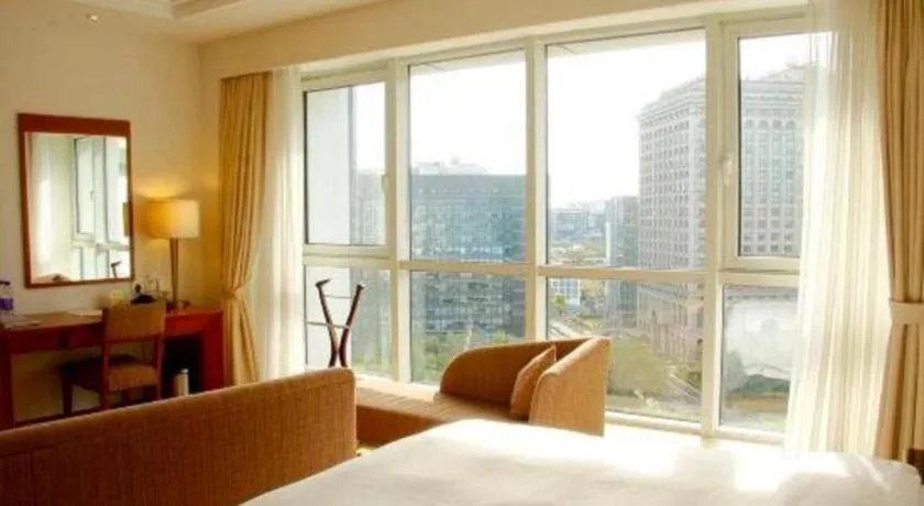 Bed in Jianguo Garden Hotel