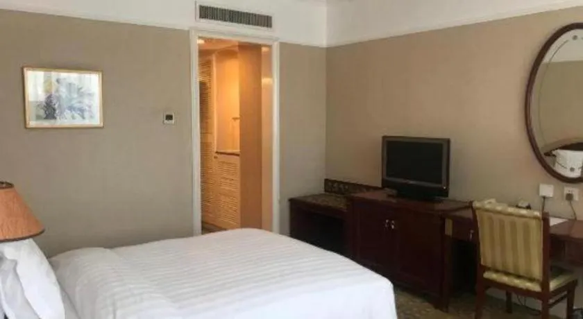 Bed in Jianguo Garden Hotel