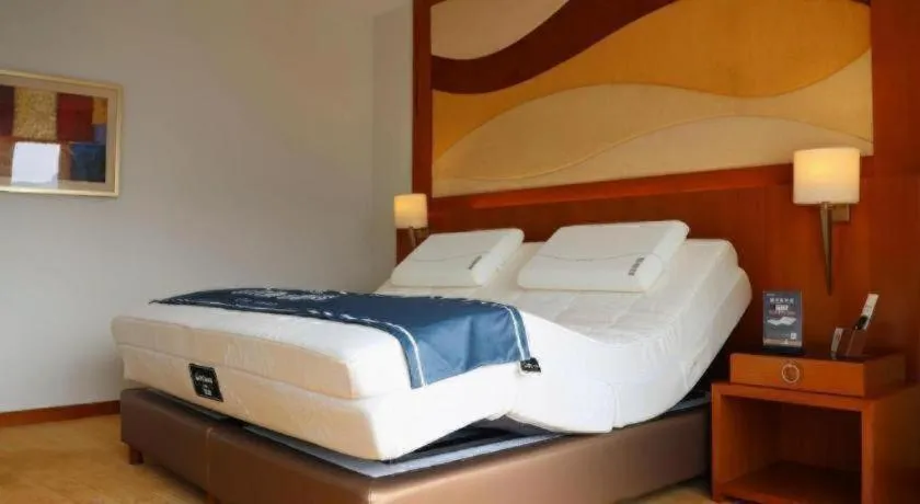 Bed in Jianguo Garden Hotel