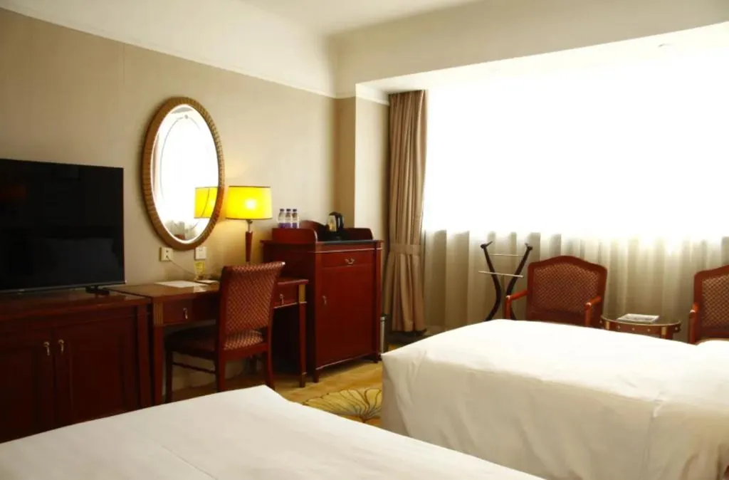 Bed in Jianguo Garden Hotel