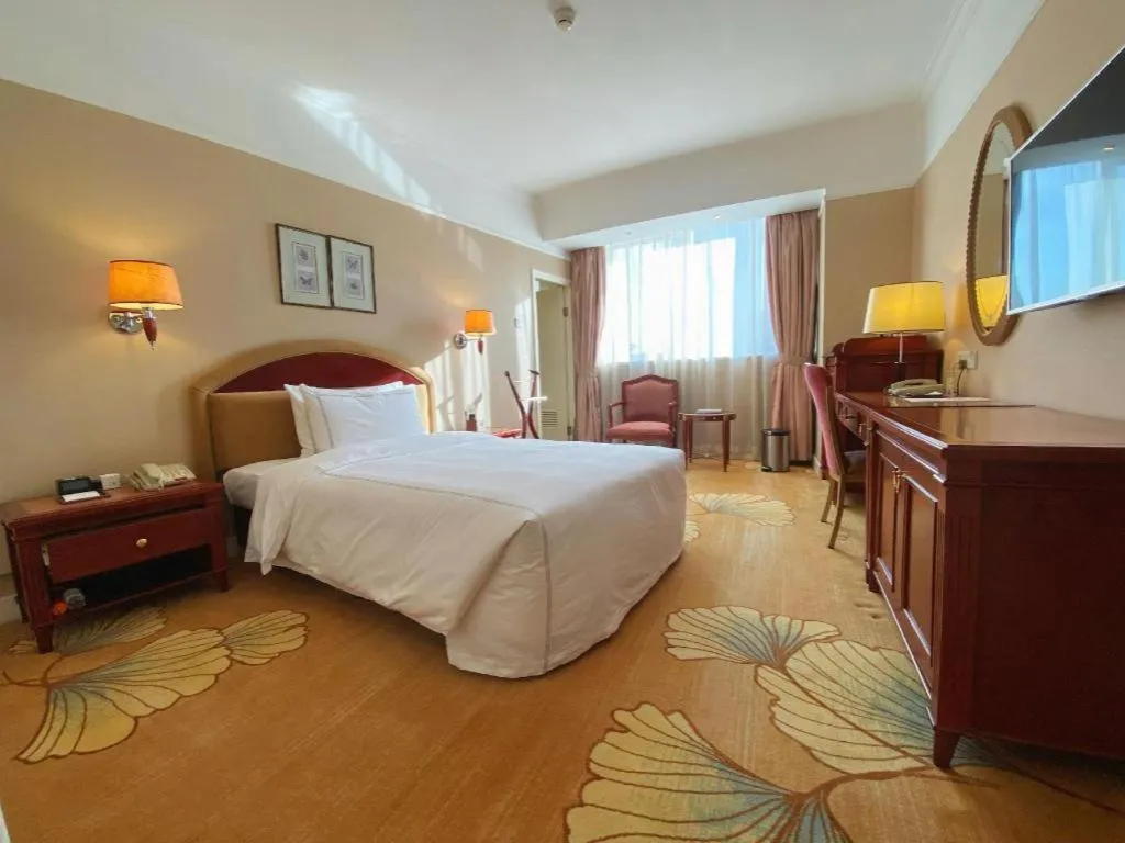 Bed in Jianguo Garden Hotel