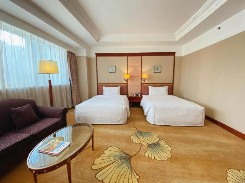 Bed in Jianguo Garden Hotel