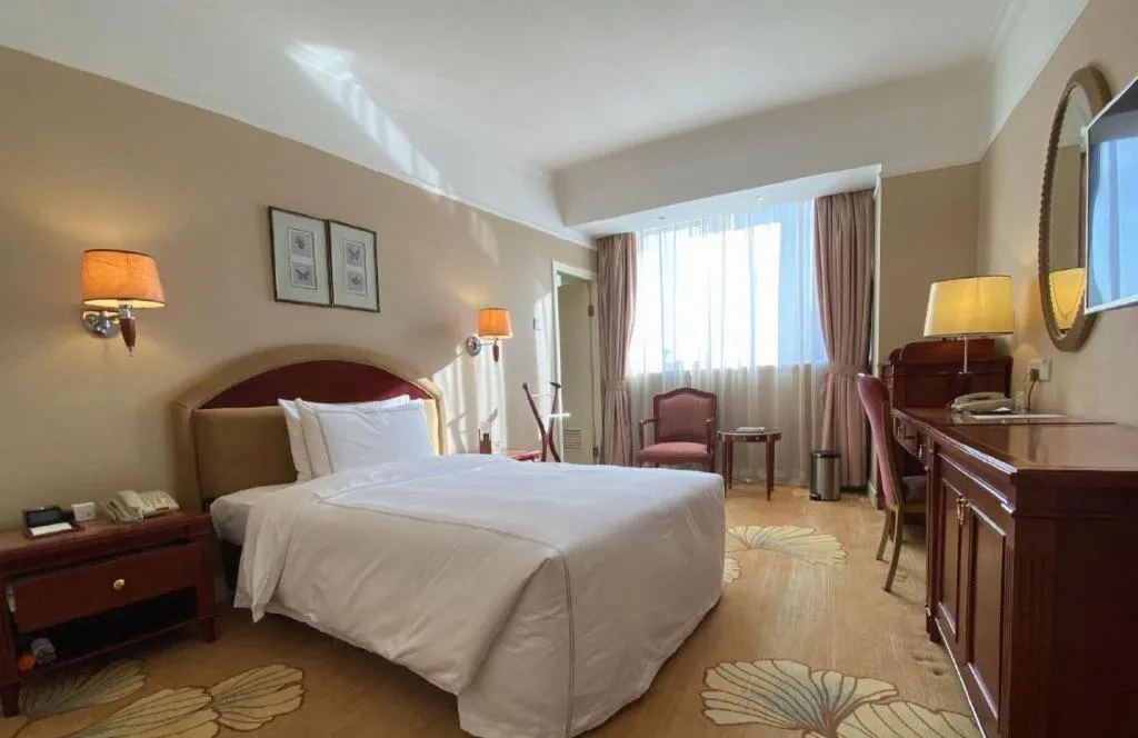 Bed in Jianguo Garden Hotel