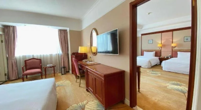 Bed in Jianguo Garden Hotel