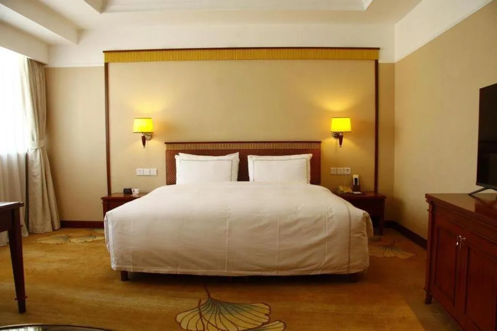 Bed in Jianguo Garden Hotel