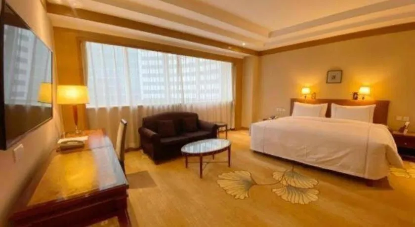 Bed in Jianguo Garden Hotel