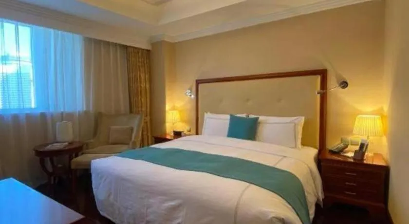 Bed in Jianguo Garden Hotel