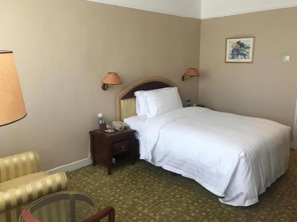 Bed in Jianguo Garden Hotel