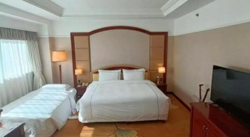 Bed in Jianguo Garden Hotel