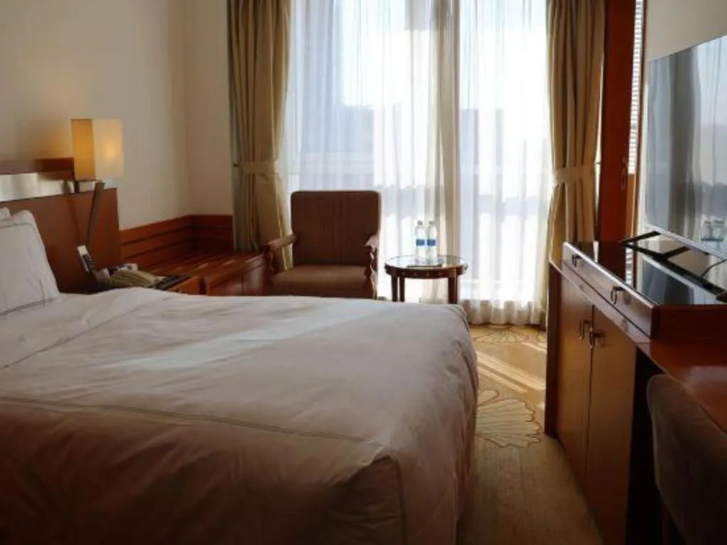 Bed in Jianguo Garden Hotel