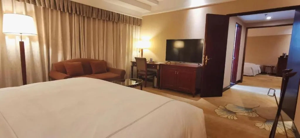 Bed in Jianguo Garden Hotel