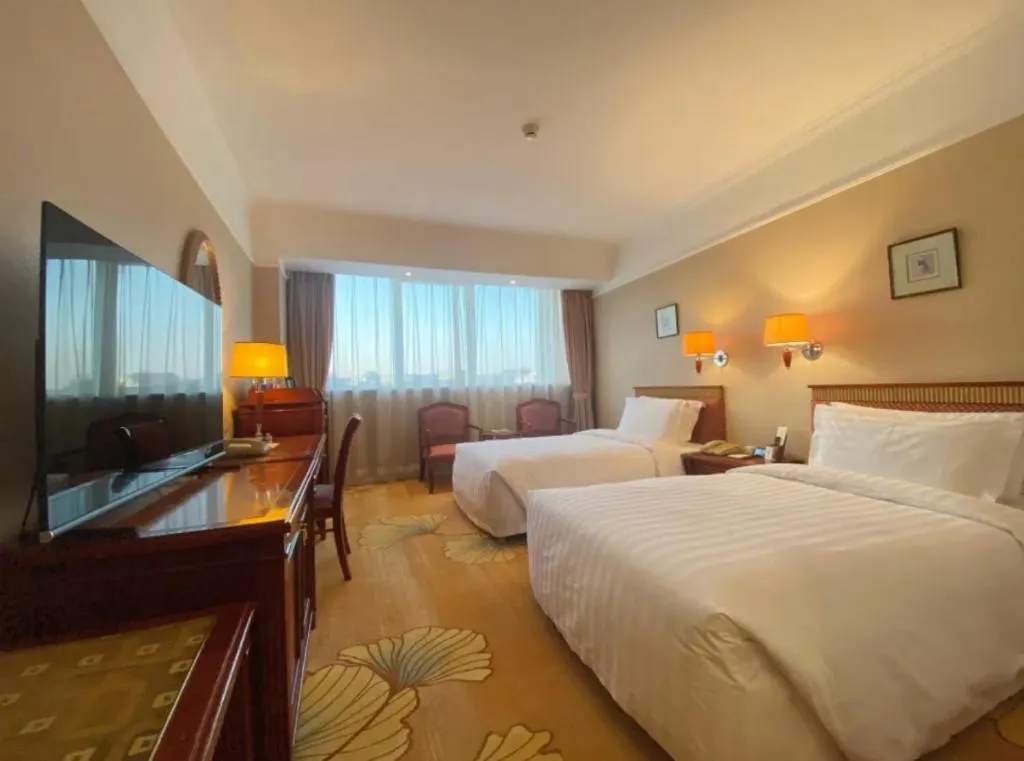 Bed in Jianguo Garden Hotel