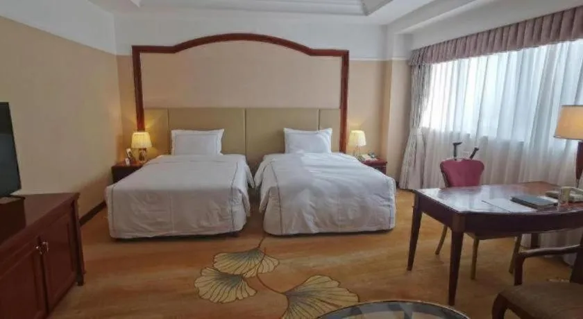 Bed in Jianguo Garden Hotel