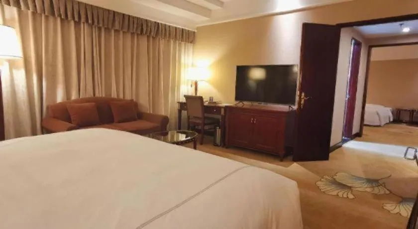 Bed in Jianguo Garden Hotel