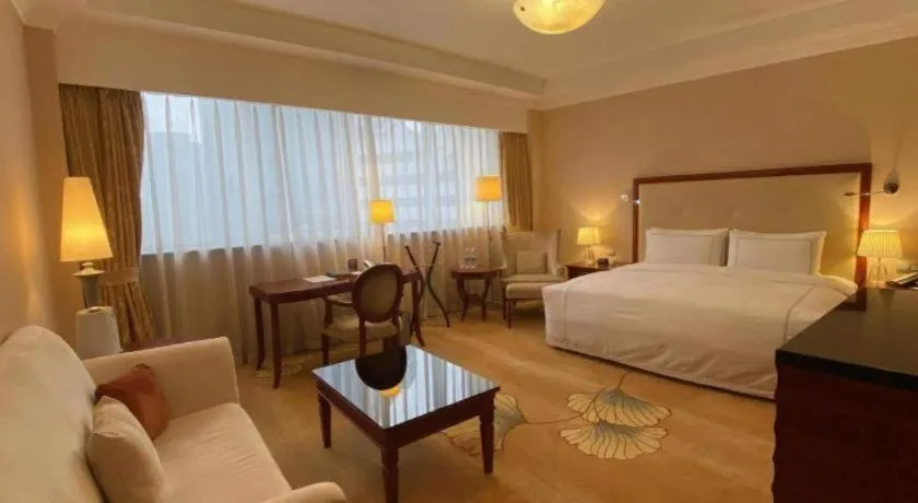 Bed in Jianguo Garden Hotel