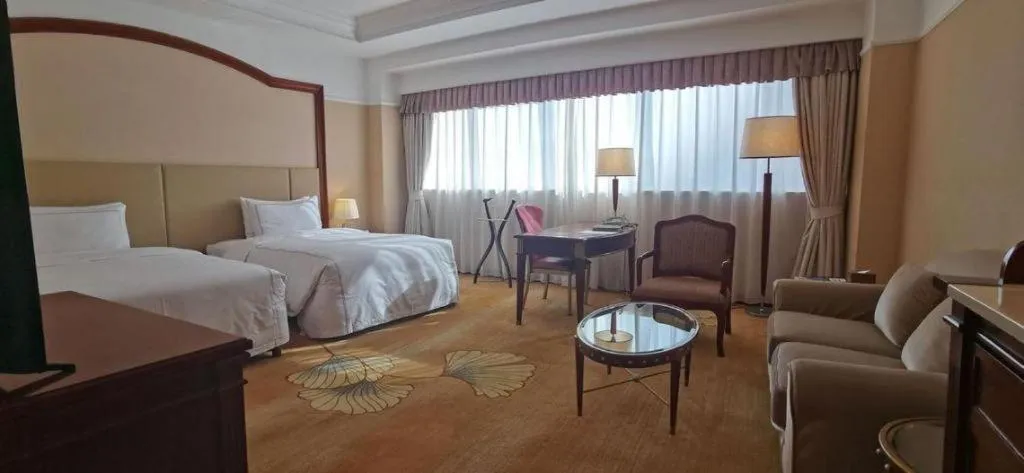 Bed in Jianguo Garden Hotel