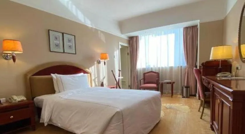 Bed in Jianguo Garden Hotel