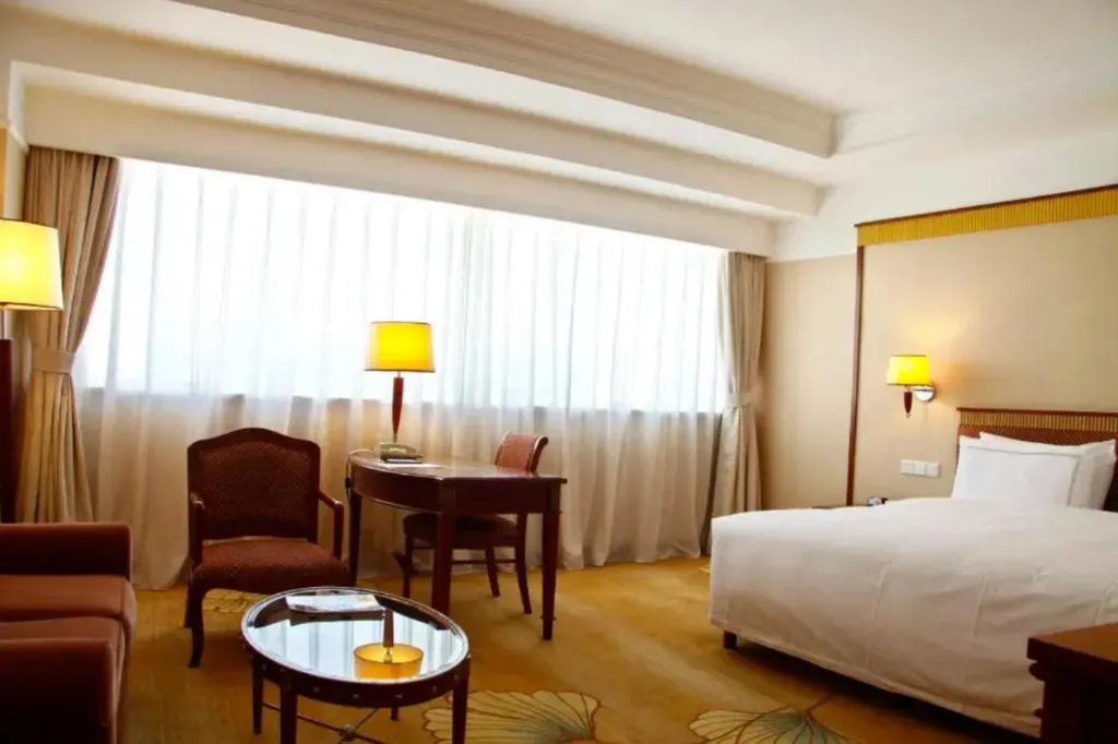 Bed in Jianguo Garden Hotel