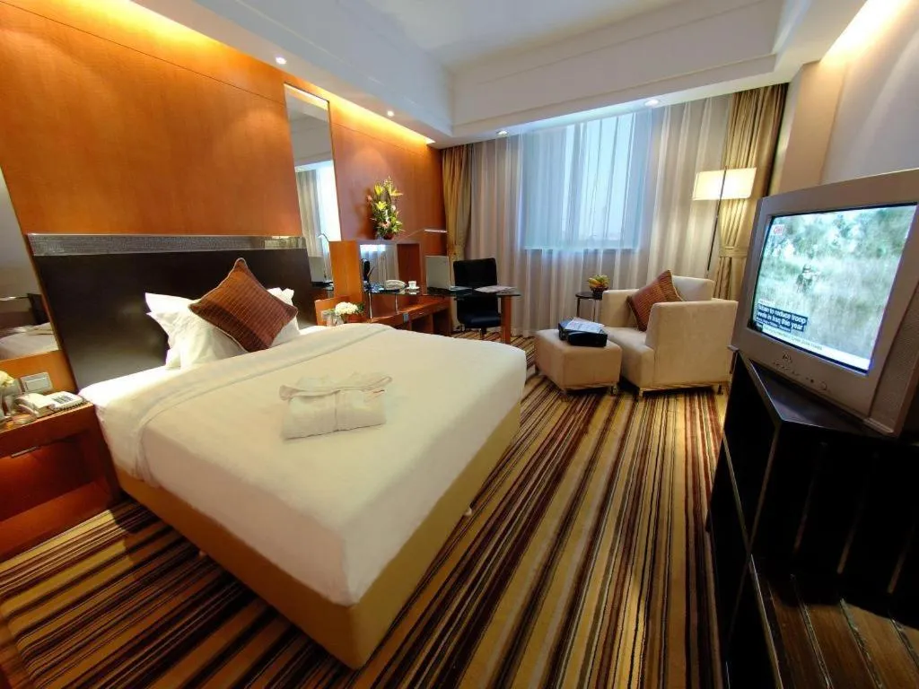 Bed in Jianguo Garden Hotel