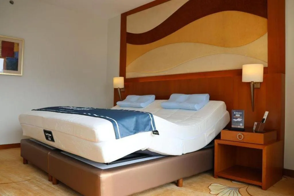 Bed in Jianguo Garden Hotel