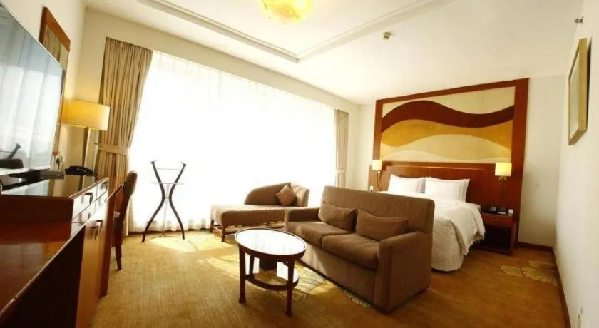 Bed in Jianguo Garden Hotel