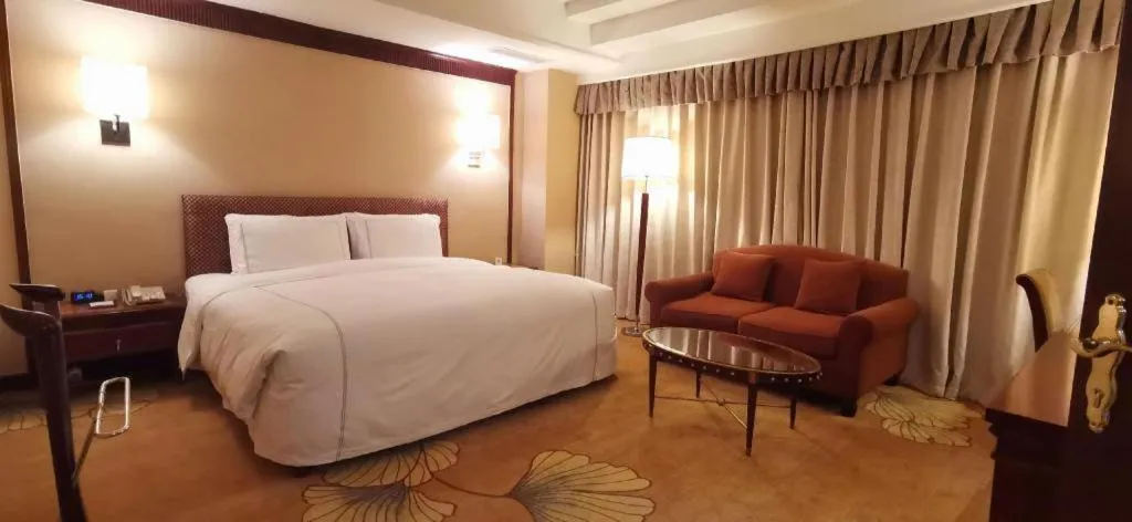 Bed in Jianguo Garden Hotel