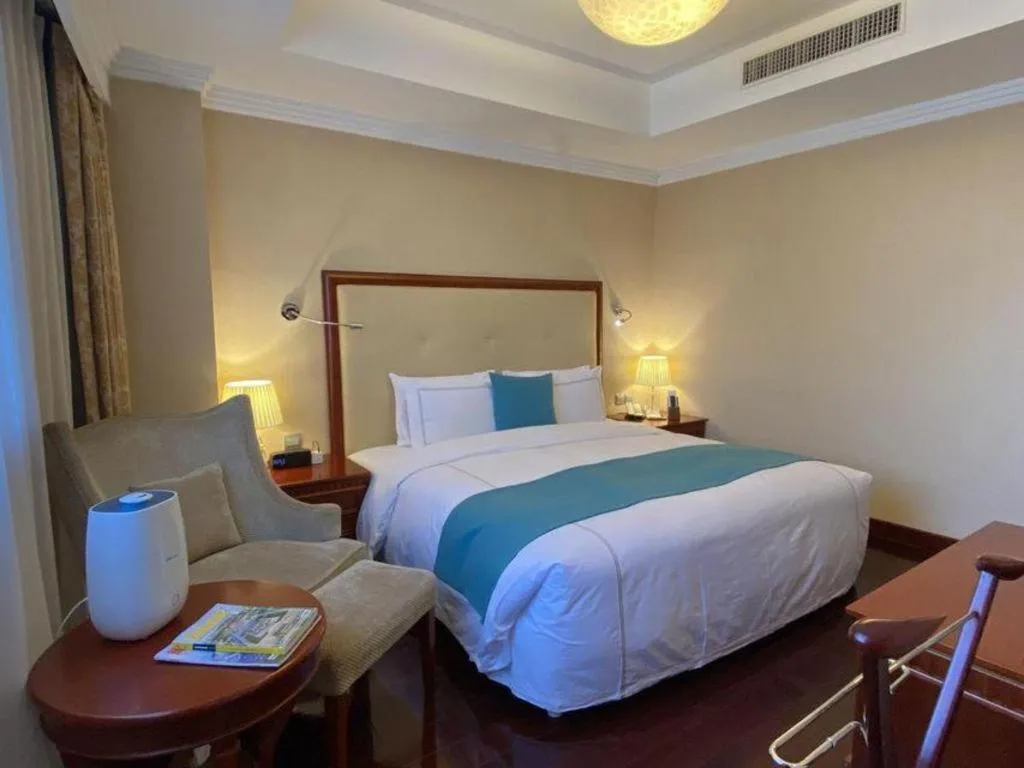 Bed in Jianguo Garden Hotel