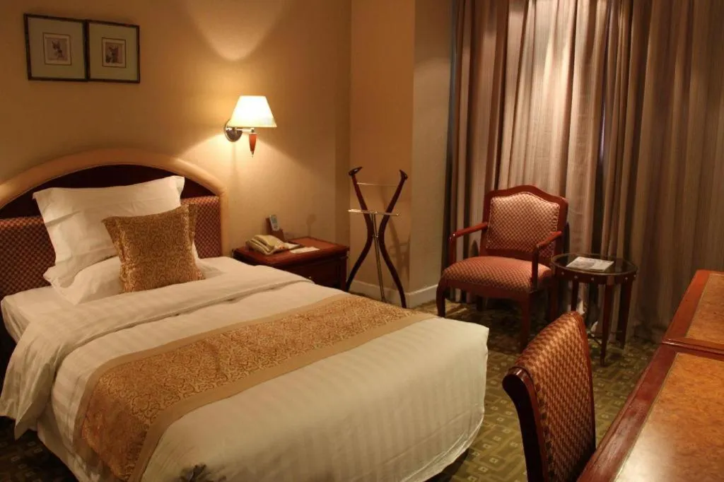 Bed in Jianguo Garden Hotel