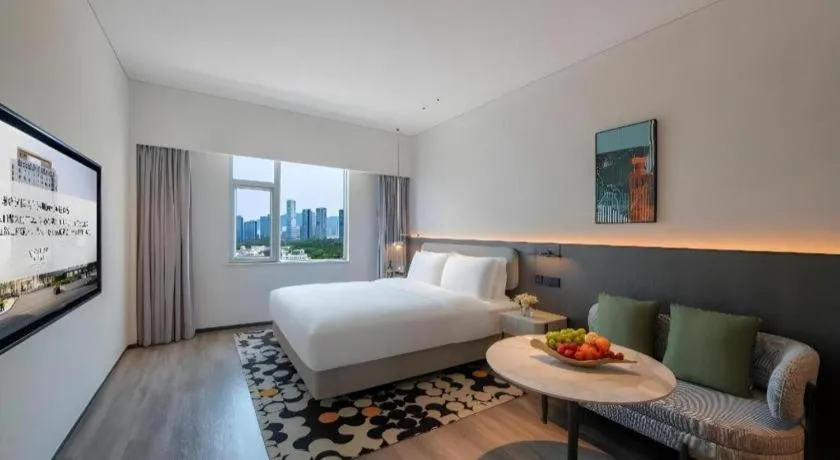 Bed in Seaview Gleetour Hotel Shenzhen Eastwing building