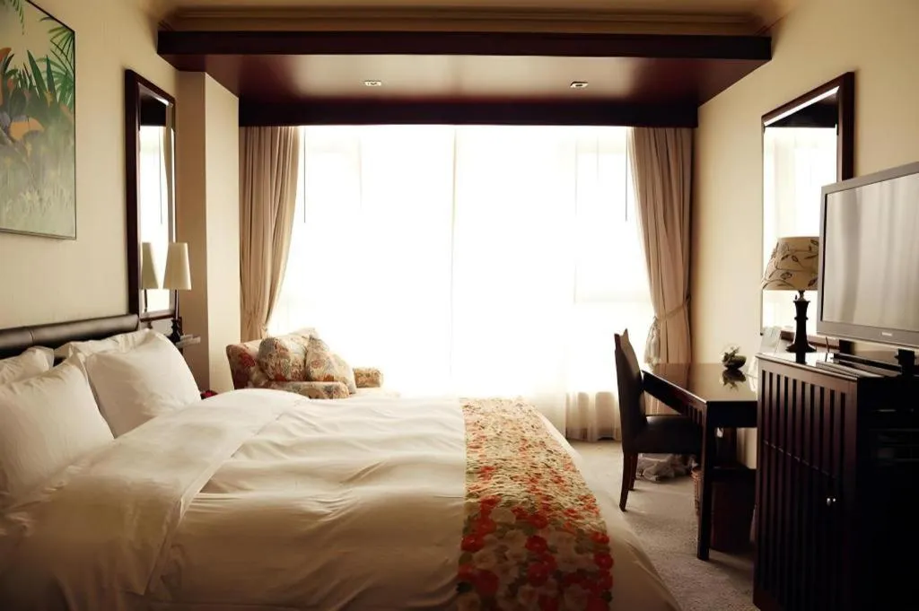 Bed in Seaview Gleetour Hotel Shenzhen Eastwing building