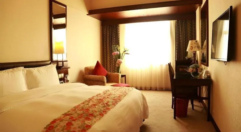 Bed in Seaview Gleetour Hotel Shenzhen Eastwing building