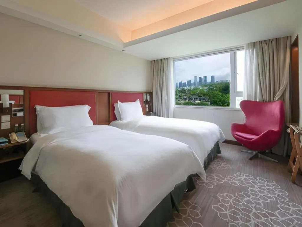 Bed in Seaview Gleetour Hotel Shenzhen Eastwing building