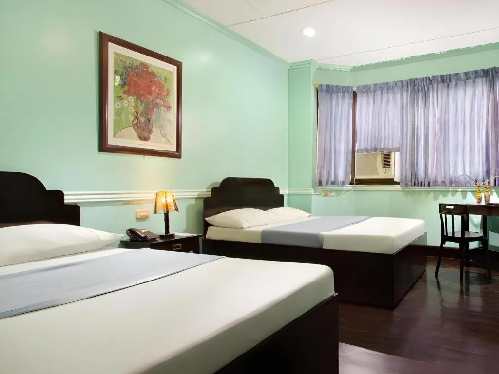 Bed in Vest Grand Suites