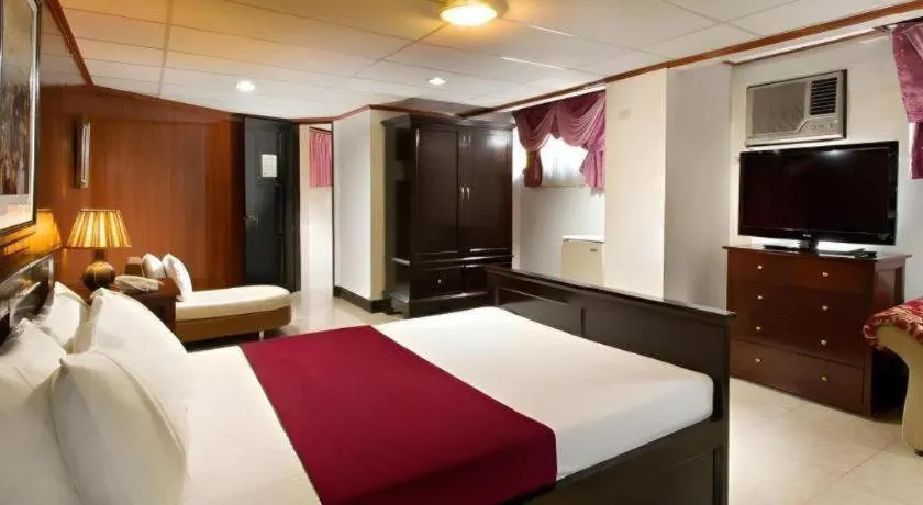Bed in Vest Grand Suites