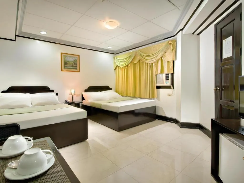 Bed in Vest Grand Suites