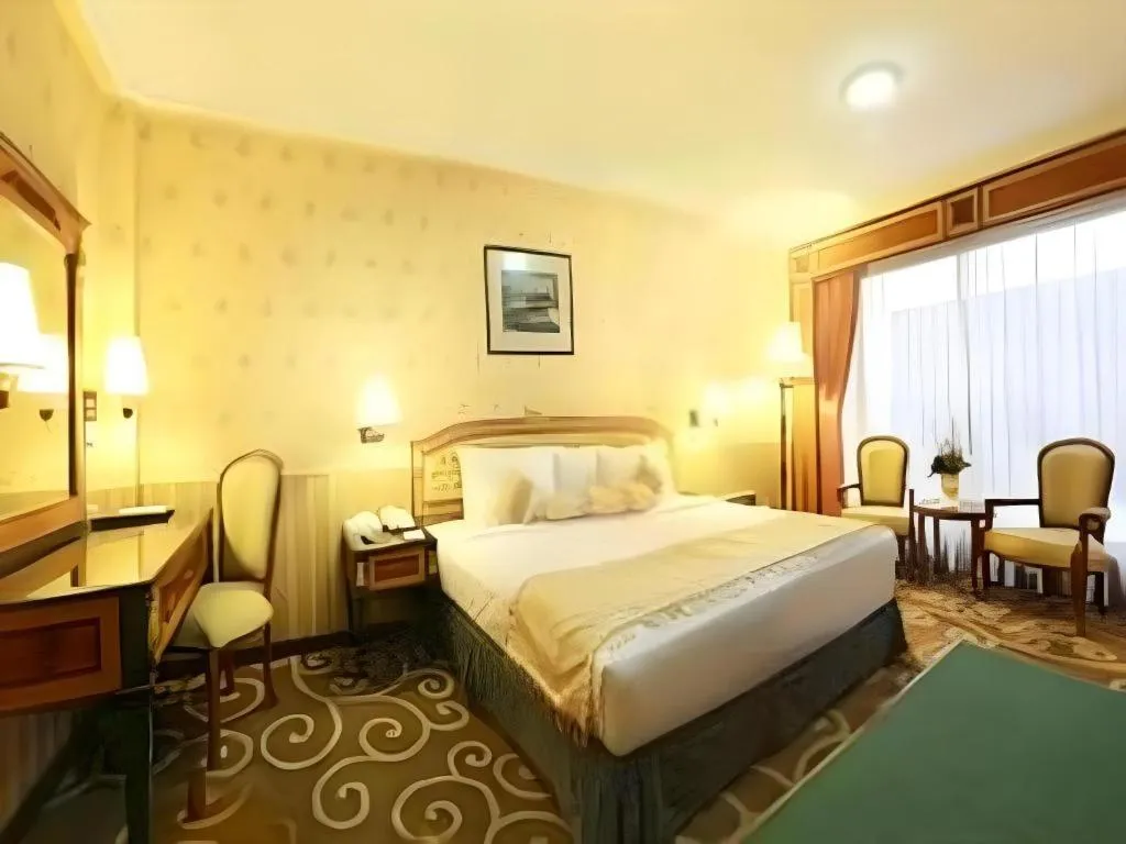 Bed in Gajahmada Graha Hotel