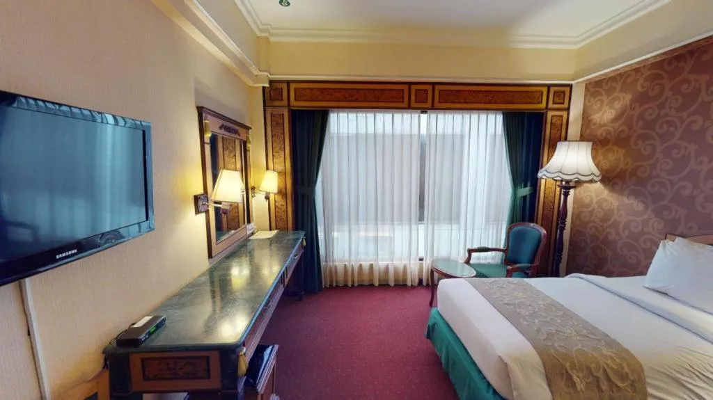 Bed in Gajahmada Graha Hotel